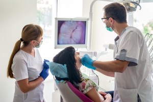 Doctor using an intraoral camera