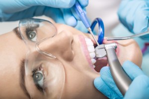 Electric handpiece being used on a patient